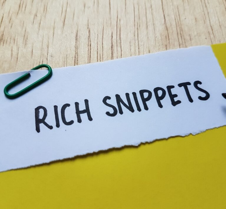 Rich,Snippets,Writting,On,Table,Background.